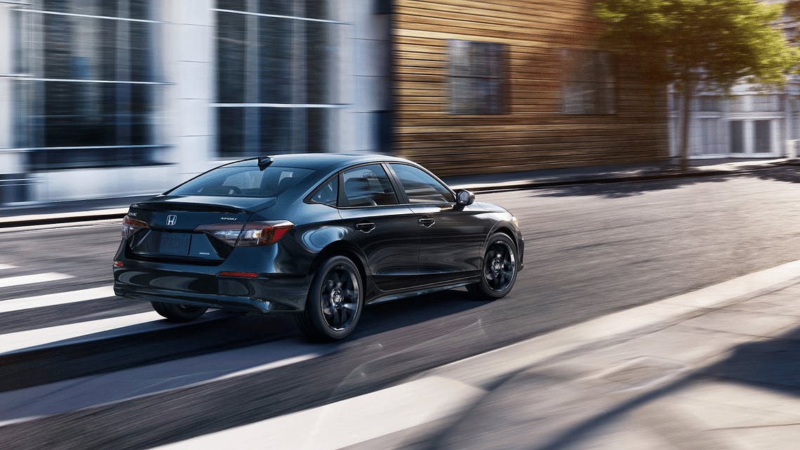 Honda Civic driving in city