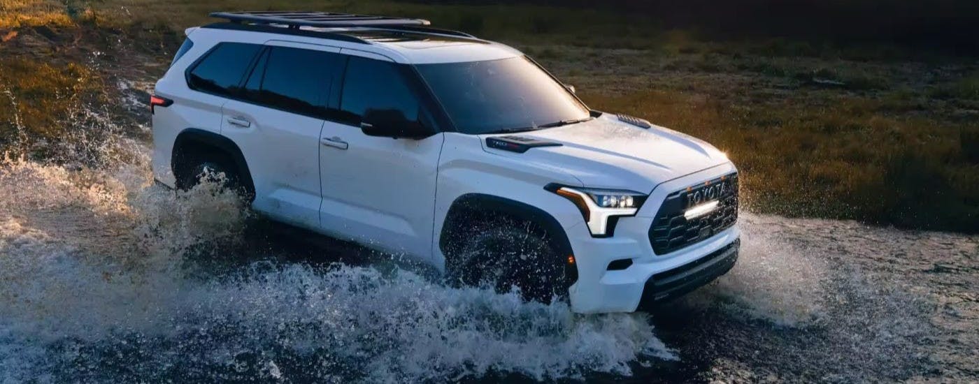 White 2024 Toyota Sequoia TRD Pro doing a water crossing