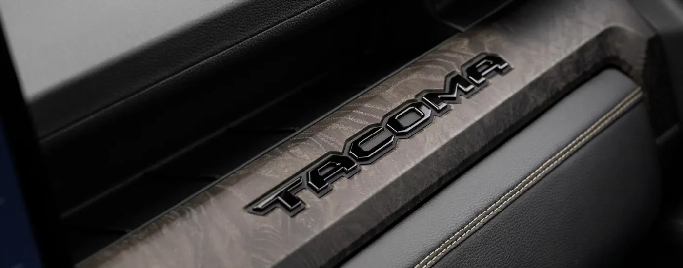 Black badge on the dash of a 2025 Toyota Tacoma