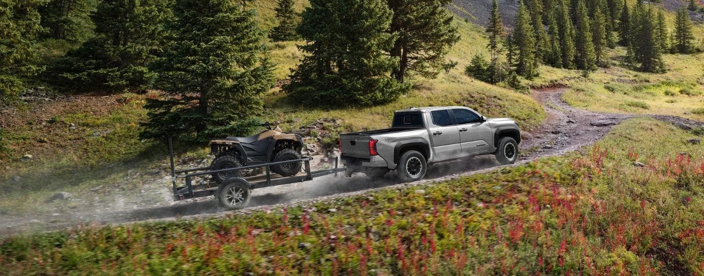 A grey 2025 Toyota Tacoma from the side.