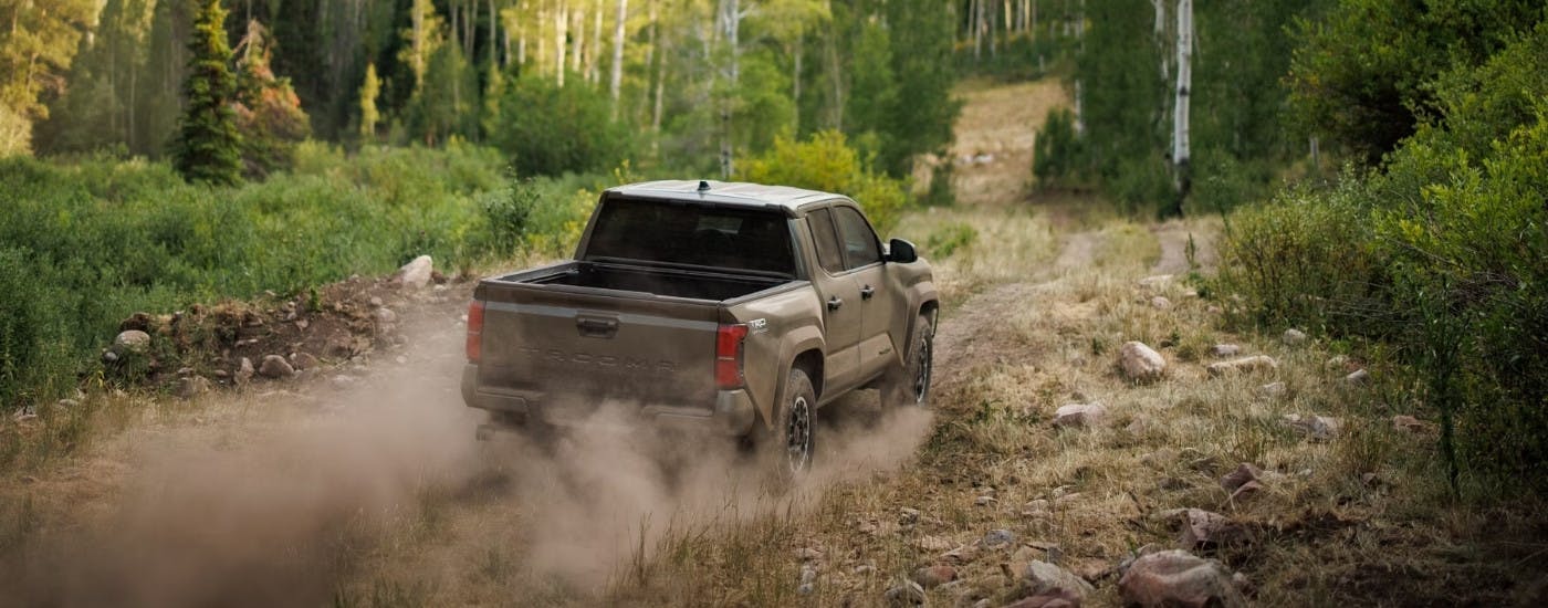 A brown 2025 Toyota Tacoma from the rear.
