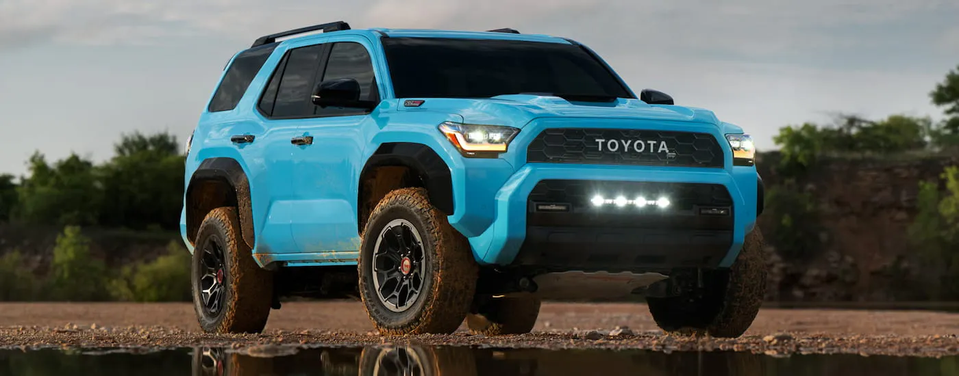 Blue 2026 Toyota 4Runner parked off-road.