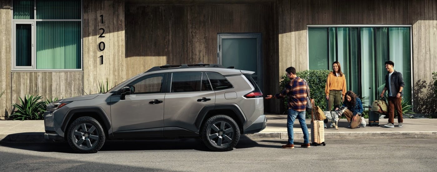 A grey 2026 Toyota RAV4 from the side.