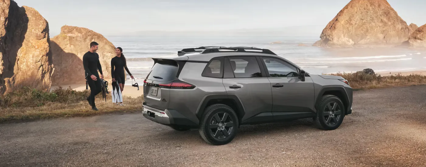 Grey 2026 Toyota RAV4 parked on a beach