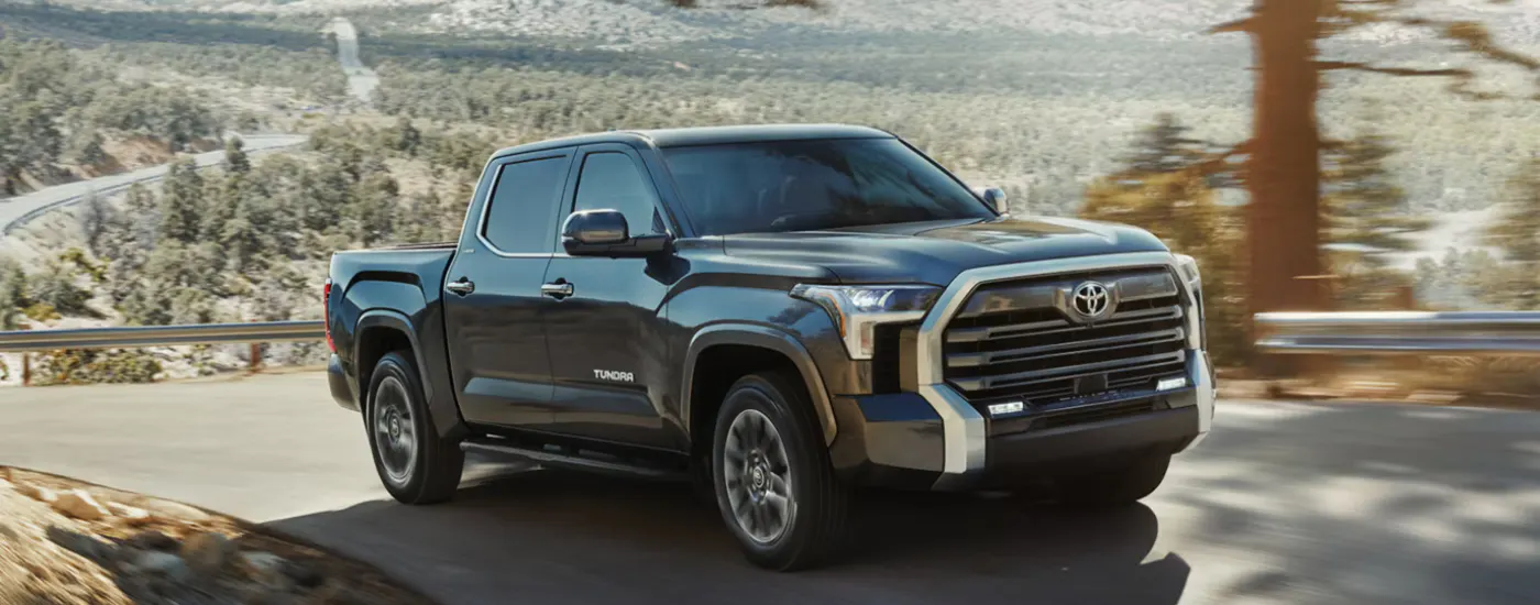 Grey 2026 Toyota Tundra driving on an open road