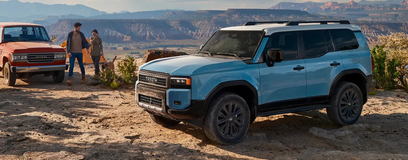 Blue 2027 Toyota Landcruiser parked on the rim on a canyon