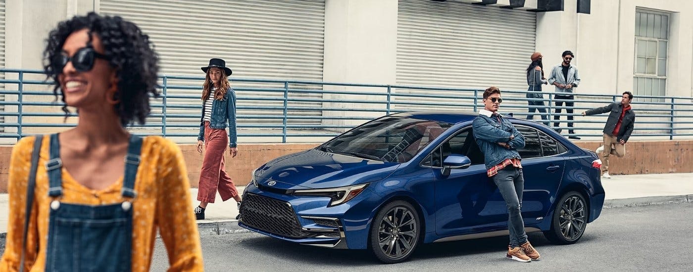 A blue 2024 Toyota Corolla from the side.