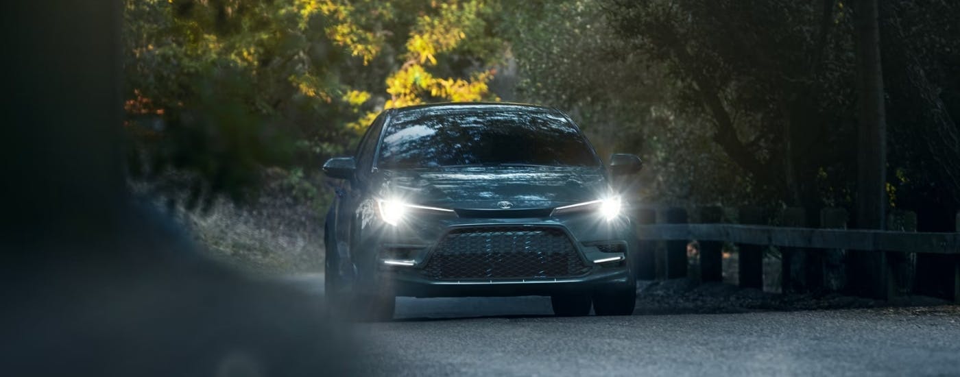 A grey 2024 Toyota Camry from the front.