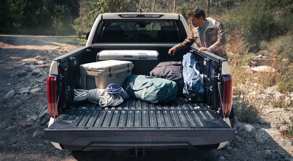 Camping gear in the bed of a gray 2026 Toyota Tundra.