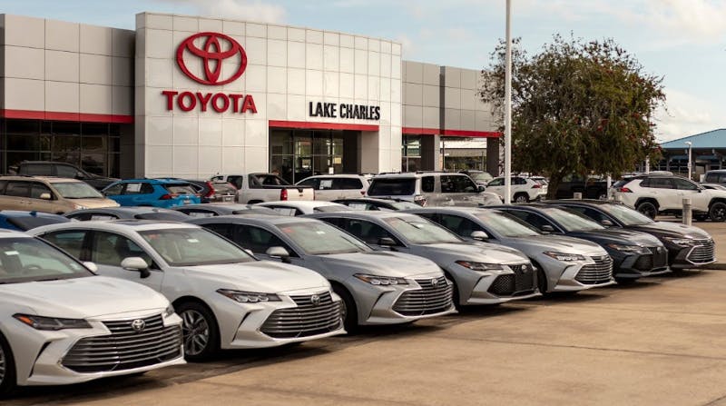 long of cars in front of Lake Charles Toyota