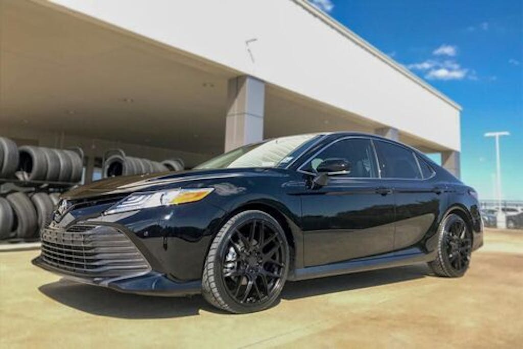 black camry parked