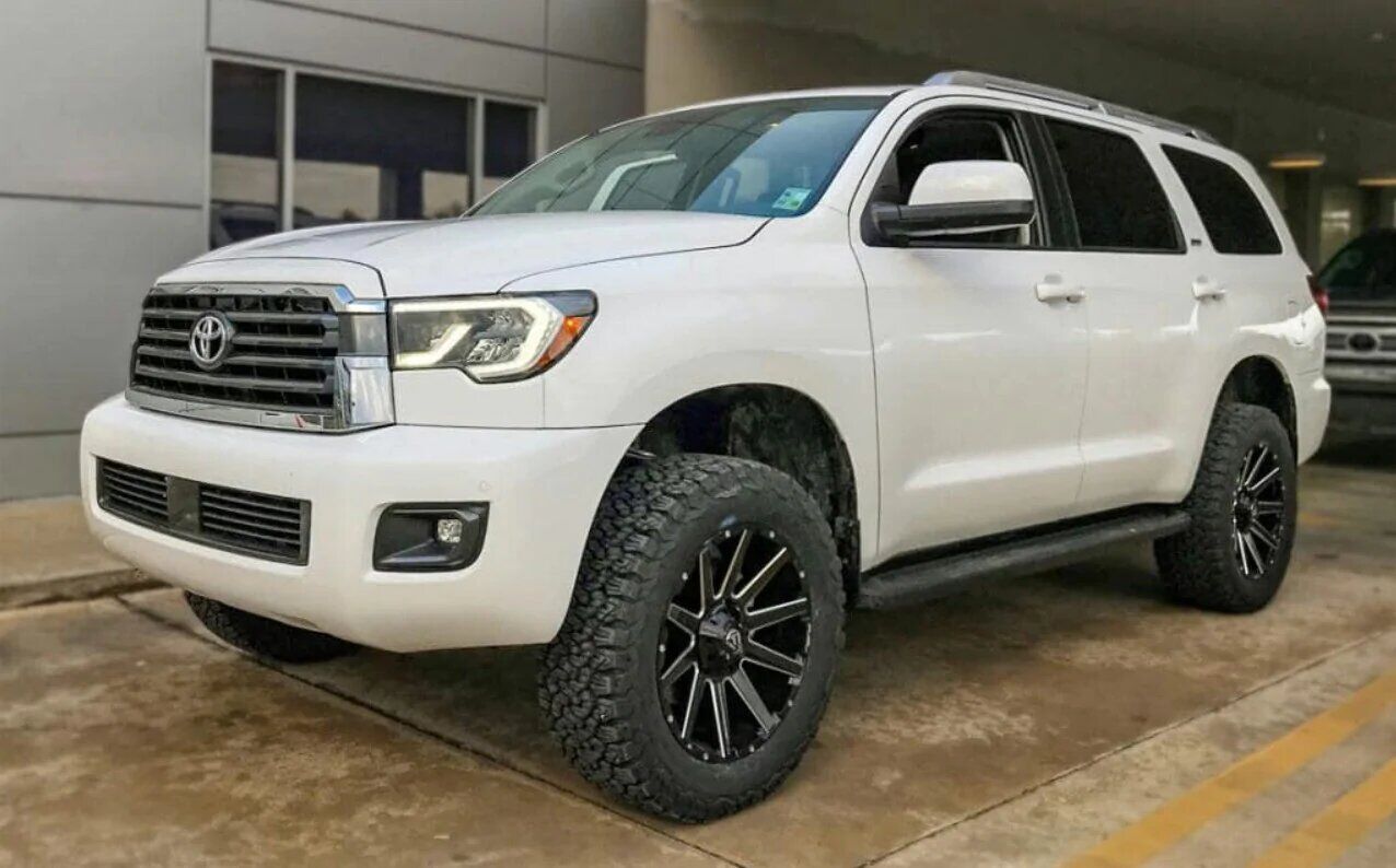 lifted while Toyota 4runner with custom wheels