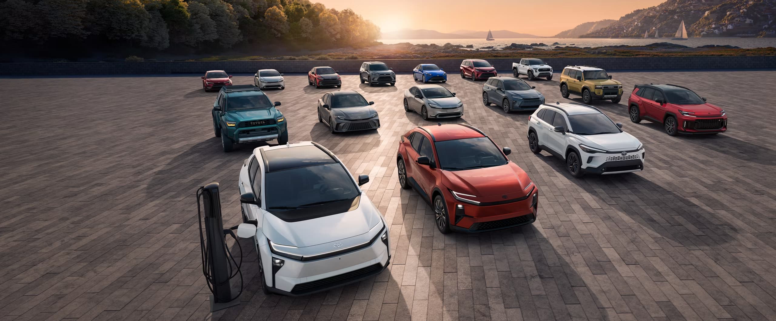 Toyota hybrid & EV vehicle driving on a scenic road