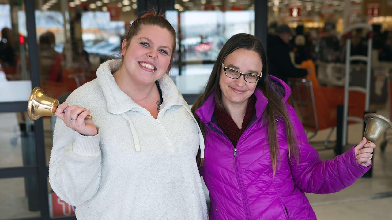 women ringing bells