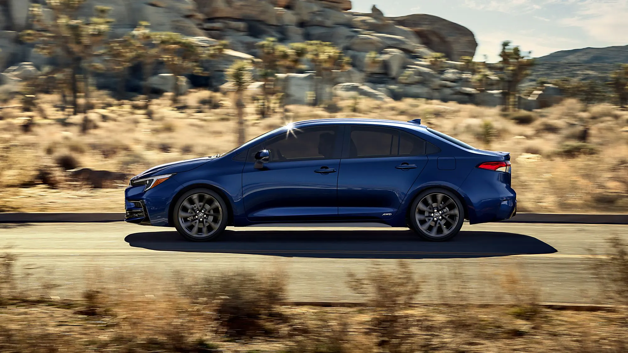 A fuel-efficient Toyota sedan on the road