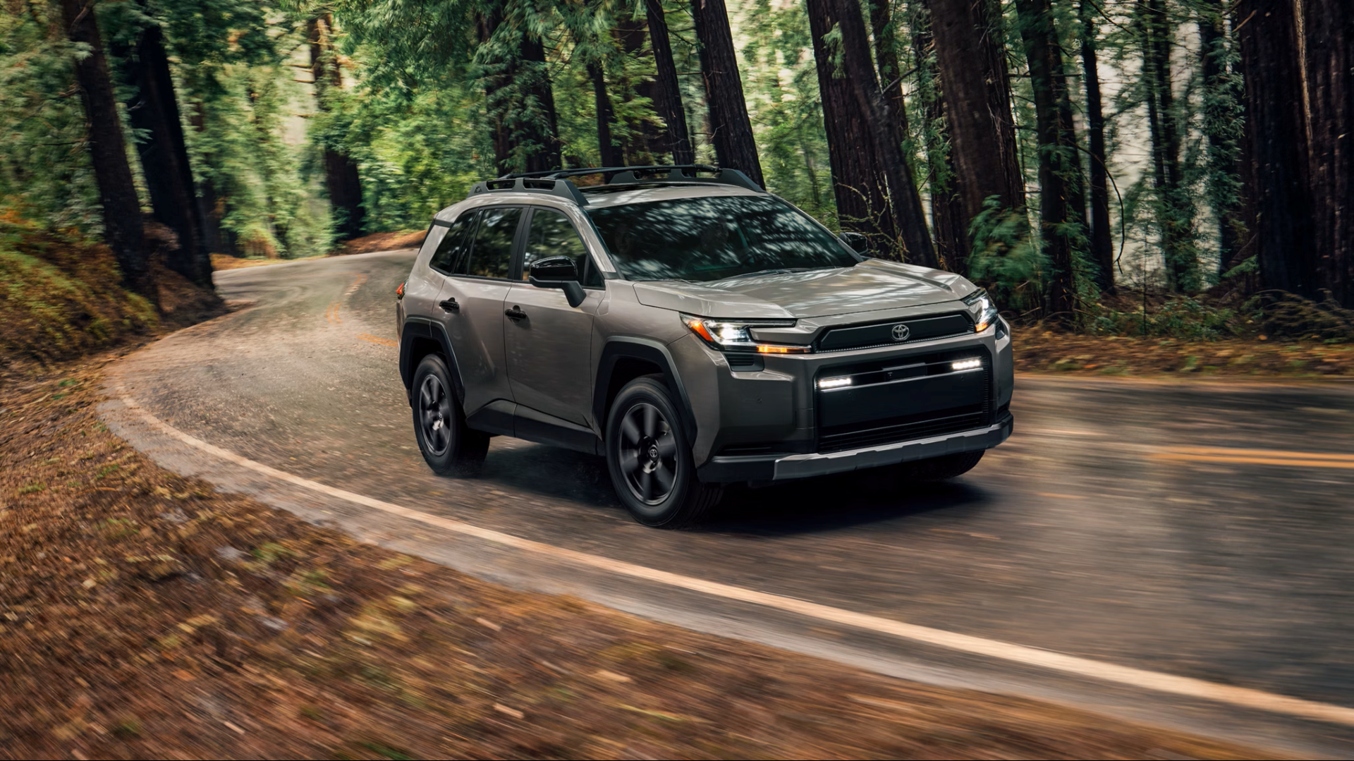  2026-Toyota-RAV4-driving-in-forest