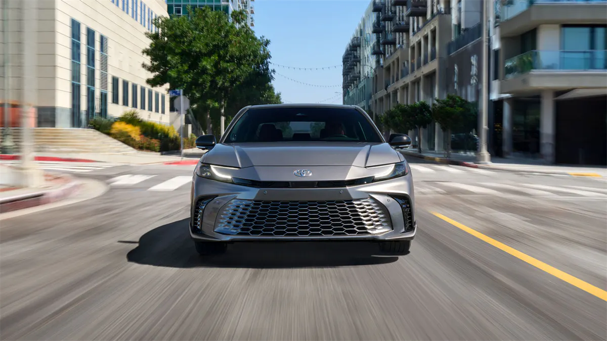 2026 Toyota Camry driving fast demonstrating its superior aerodynamics