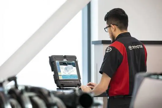 Service advisor assisting customer