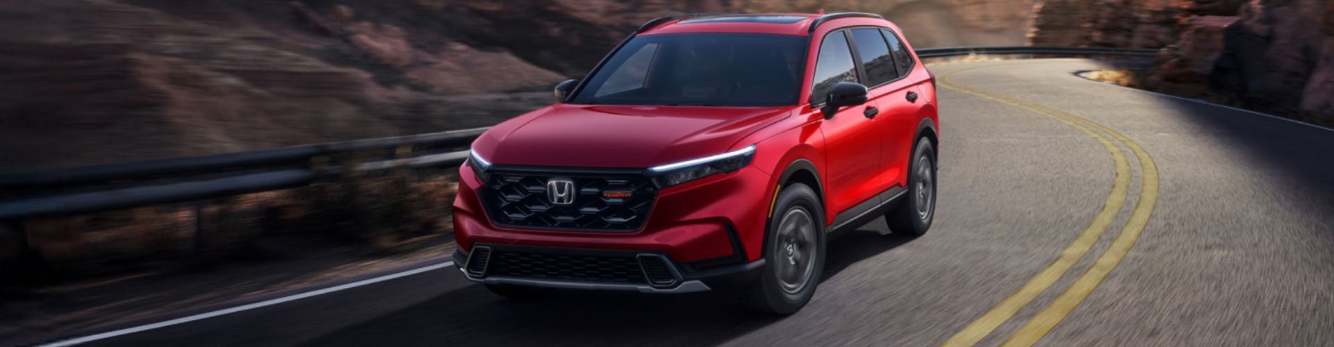 Honda CR-V driving down the road