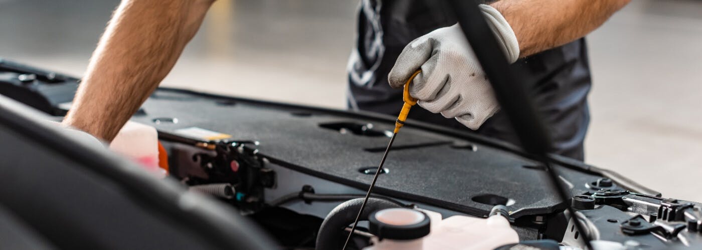 Mechanic doing an oil change