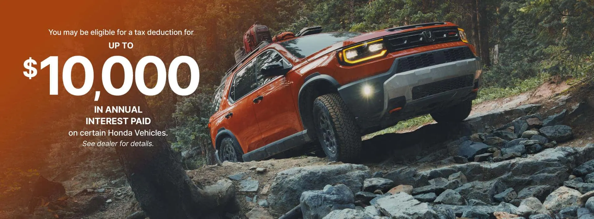Honda SUV crawls up a rocky trail 