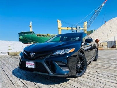 Toyota of Portsmouth vehicle on rooftop.