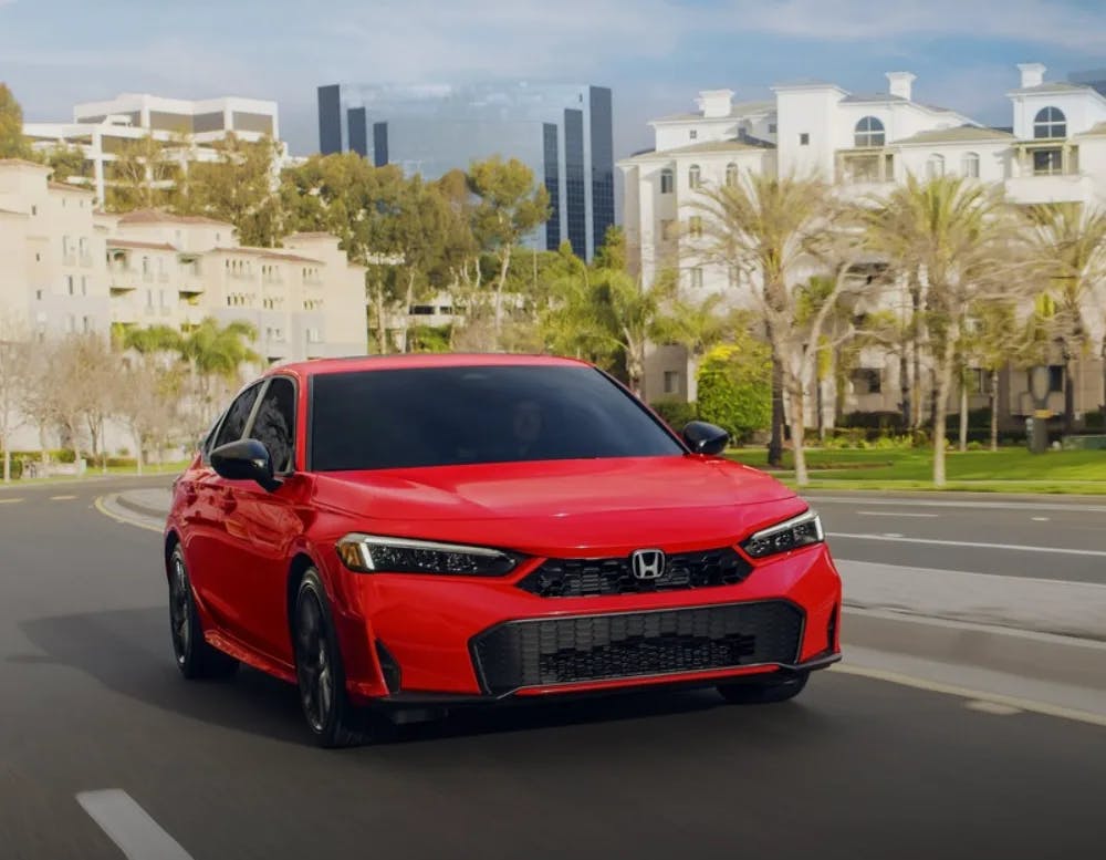 Honda car driving in city