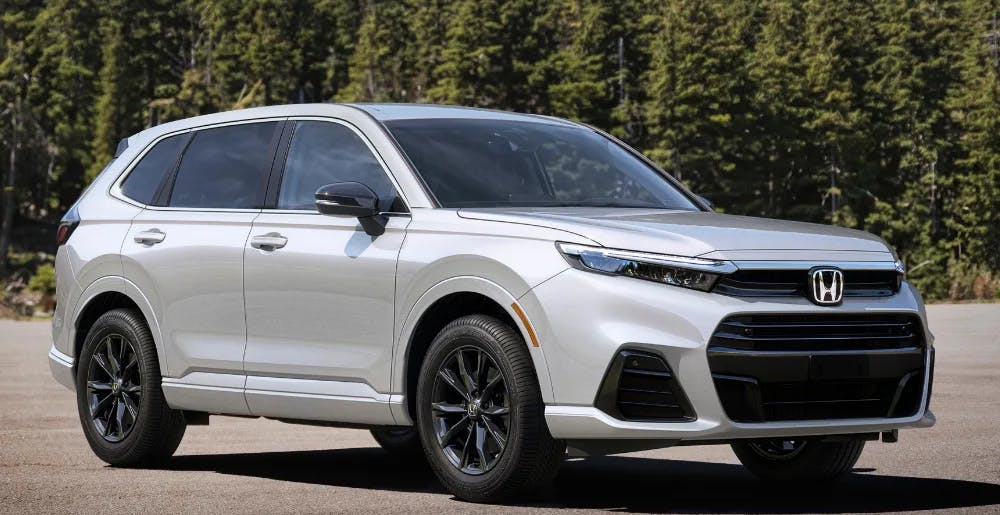 insights blog header Honda SUV parked near forest